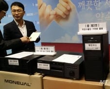 모뉴엘 박대표 체포…'007 작전' 막전막후