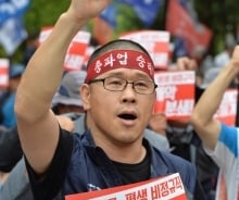 한상균 민노총위원장 "민중총궐기로 정권 심판"…경찰, 검거시도 무산