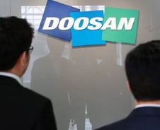 반값에 공작기계 매각 강수…통큰 두산