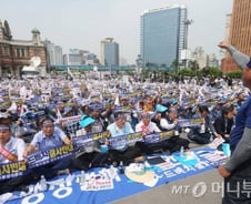 '서울 사드집회' 성주군민, 머리엔 왜 파란리본을?