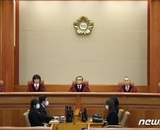 [단독] '포토라인 금지' 법무부 훈령 위헌여부 헌재서 가린다