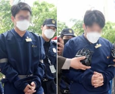 '라덕연 측근' 변씨·안씨, 고개 푹 숙이고 구속영장심사 출석