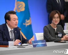 되살아난 망령 '코리아 신드롬'[광화문]