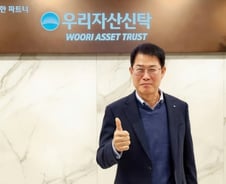 내부통제·그룹 시너지로 시장 선도…기지개 켜는 우리자산신탁