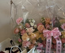 금메달 받자 깜짝 선물…최가온 챙긴 '키다리 아저씨' 신동빈 회장