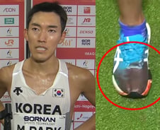 발바닥 찢어진 채 42㎞ 완주…한국 마라토너, 피로 물든 운동화